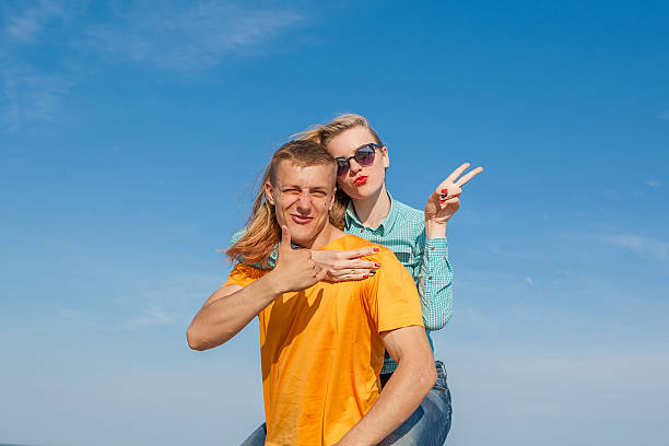 istock Happy young joyful guy and girl 540994672