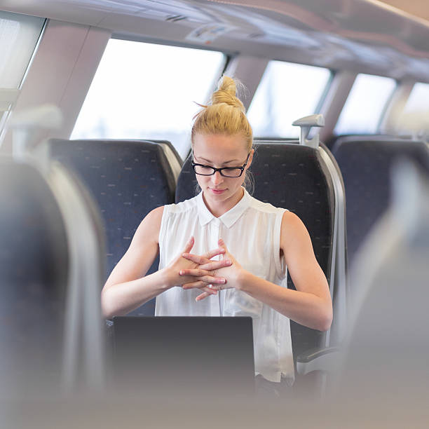 istock Woman streching while travelling by train. 540997098