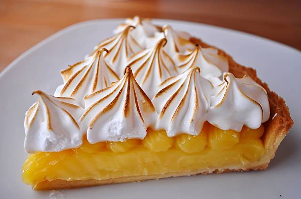 istock Lemon Tarts in plate white on wooden table. 541003038