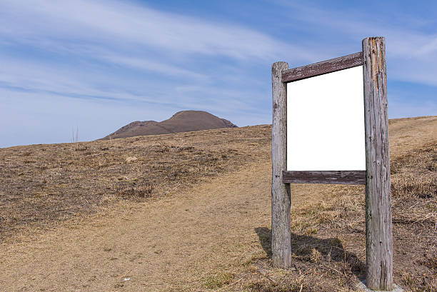 istock blank billboard wooden in the mountain landscape 541003358