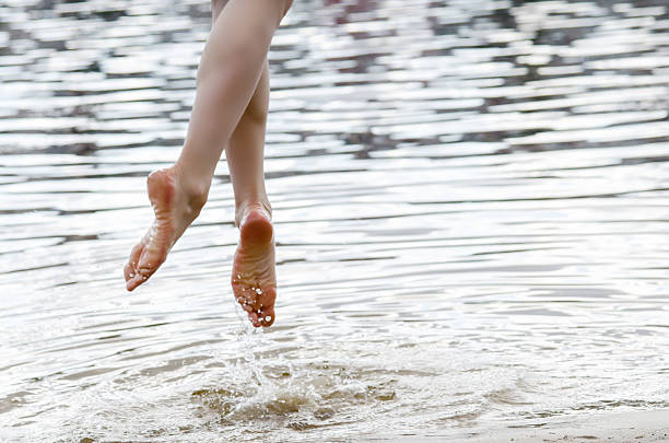 istock Woman jumping on the beach 541005294