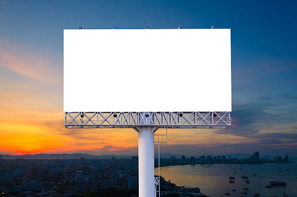 istock Blank billboard ready for advertisement in city downtown with su 541007026