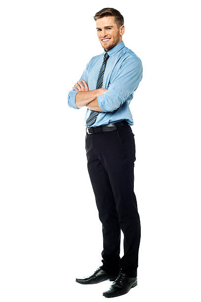 istock Smart smiling businessman with arms crossed 541007048