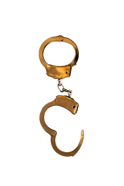 esposas - golden handcuffs fotografías e imágenes de stock