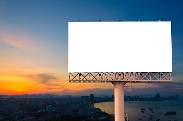 istock Blank billboard ready for advertisement in city downtown with su 541113816