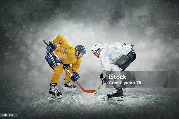 Ice Hockey Player On The Ice Outdoors Stock Photo - Download Image Now - Ice Hockey, Hockey, Ice