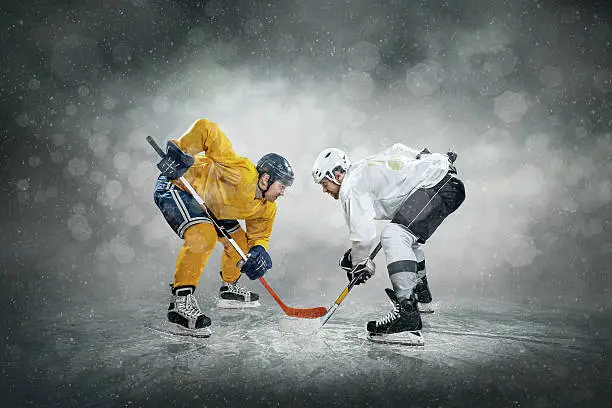Photo of Ice hockey player on the ice, outdoors
