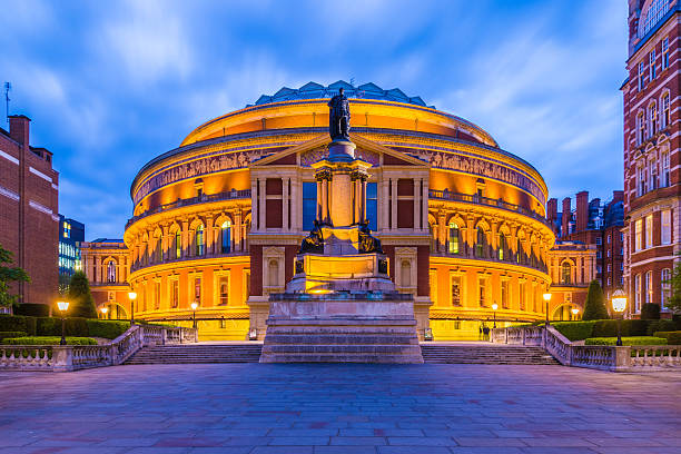 Royal Albert Hall London, UK - May 18, 2016 - Royal Albert Hall at night, a famous concert hall on the northern edge of South Kensington george vi stock pictures, royalty-free photos & images