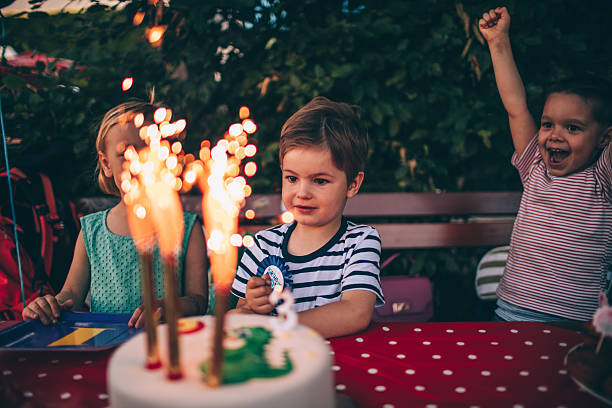 istock Candles on a birthday cake 541116684