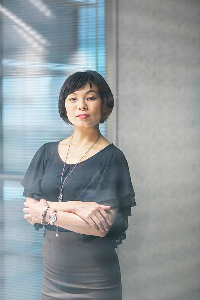 istock Business woman through office glass 541116914