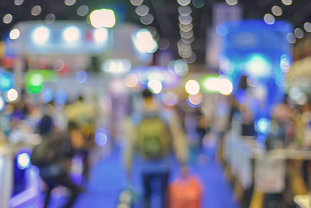 istock Abstract of blurred people walking in shopping centre 541117304