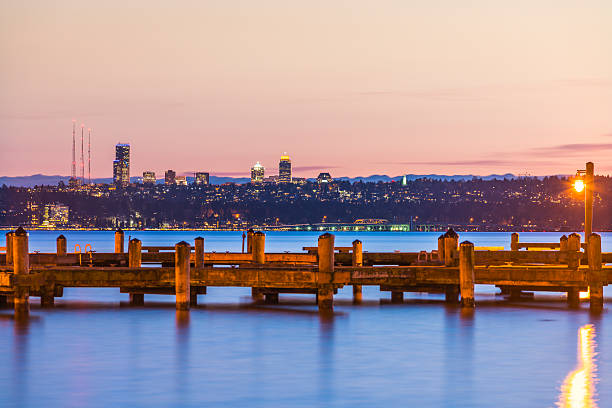 dock with background of Bellevue cityscape with reflection.