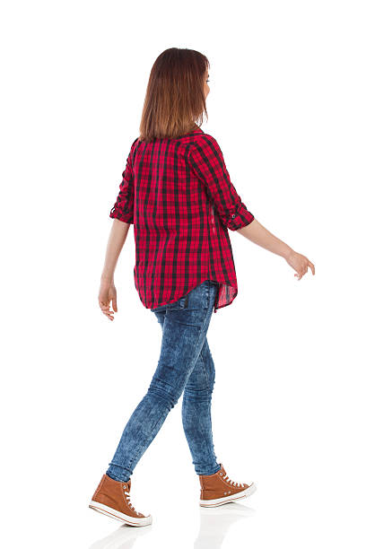 istock Walking Casual Girl Rear View 541118374