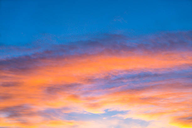 istock Dramatic sunset sky with orange colored clouds in summer season. 541120128