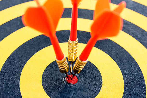 istock One target with three dart arrows hitting the bullseye 541120166