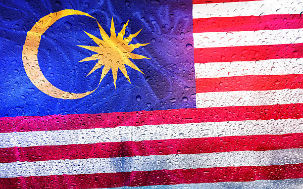 istock Malaysia and Malaysian flag with drops 541120638