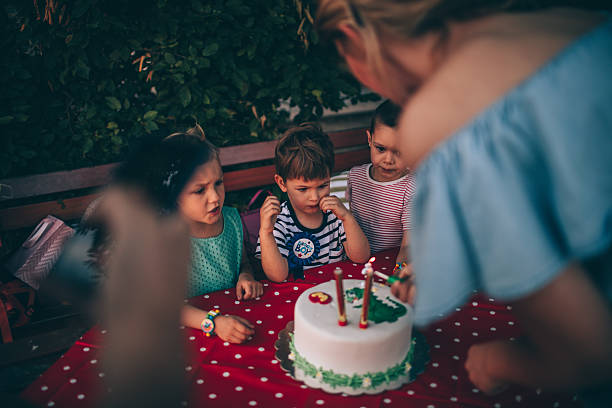 istock Lightning candles on a birthday cake 541120758