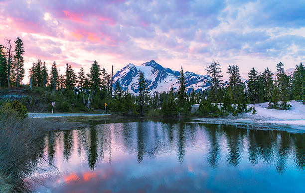 mt. Shucksan with reflection on the lake when sunrise. scene of mt. Shucksan with reflection on the lake when sunrise,Washington,usa. mt shuksan stock pictures, royalty-free photos & images