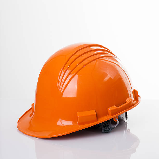 istock Orange safety helmet on white background 541121584