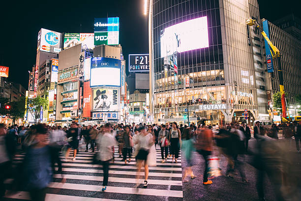 shibuya w tokio - crosswalk crowd activity long exposure zdjęcia i obrazy z banku zdjęć