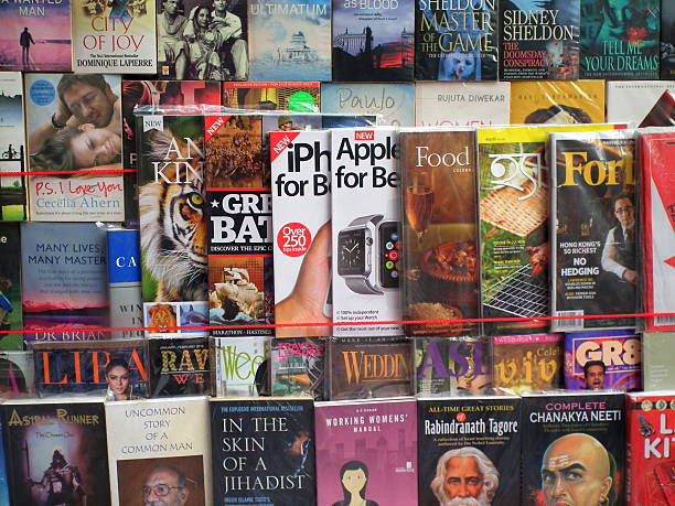 Kolkata, India - May 5, 2016: Various Books from different genre for sale creating a diverse colorful concept at a roadside makeshift shop at Kolkata, which is called the Cultural capital of India