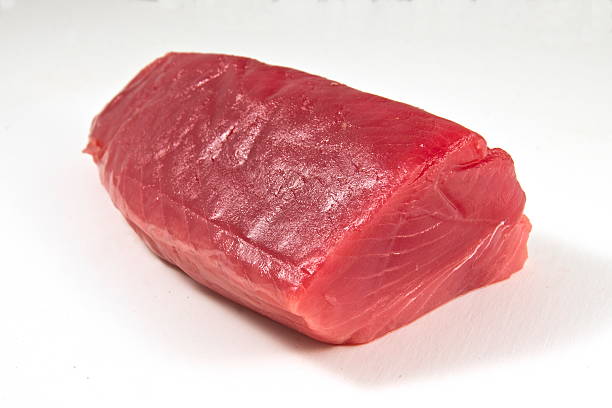 Tuna fillet, white background. stock photo