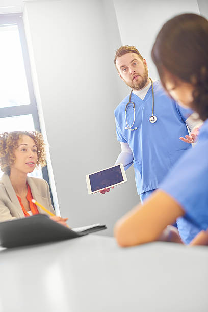 istock hospital staff meeting 541125920