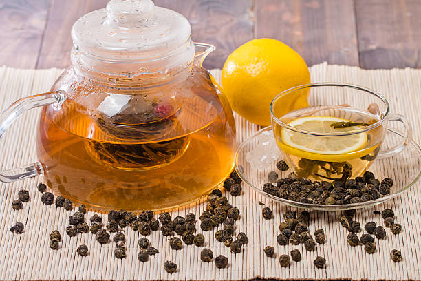 istock Cup of green tea with 541126620
