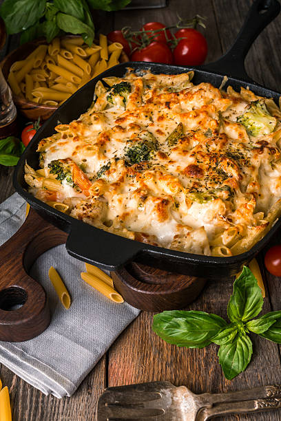 istock Baked pasta with broccoli, cauliflower, cheese and bechamel sauc 541130192