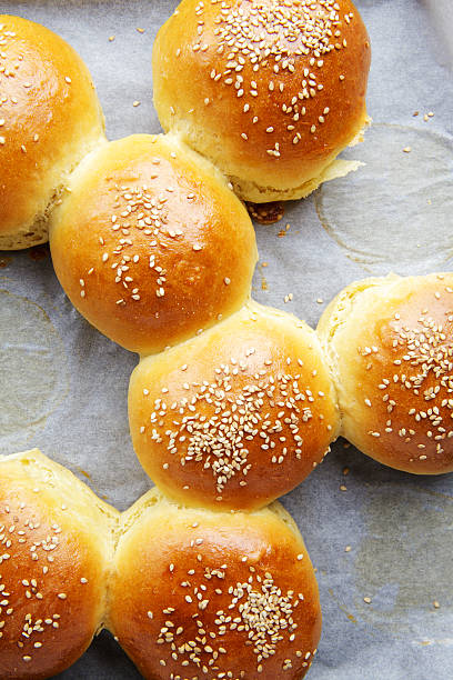 istock Tasty buns with sesame on oven-tray 541132232