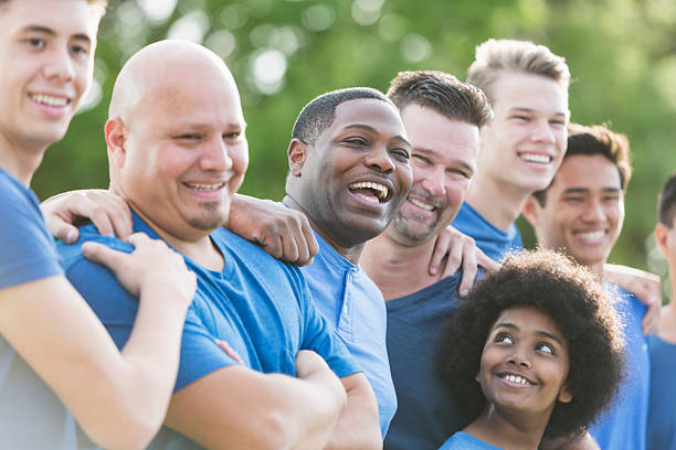 istock Multi-ethnic group of men and sons standing outdoors 541133774