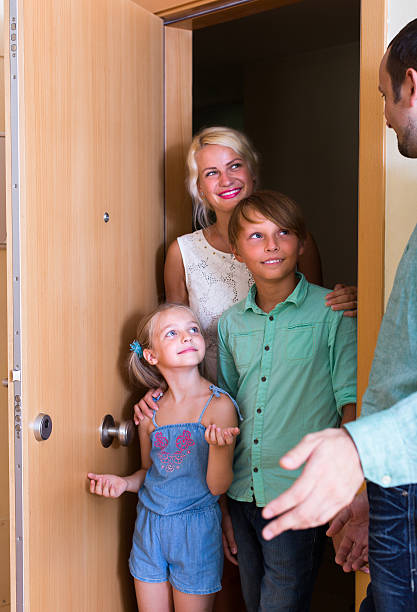 istock Greeting guests at the door 541134518