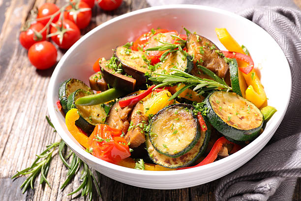 fried vegetable and rosemary fried vegetable and rosemary ratatouille stock pictures, royalty-free photos & images