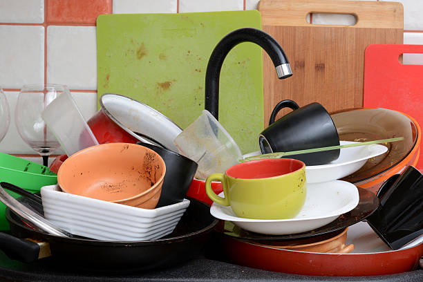 istock dirty dishes in the sink 541140324