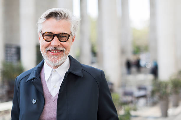 istock Parissien man smiling at camera on Paris streets 541141034