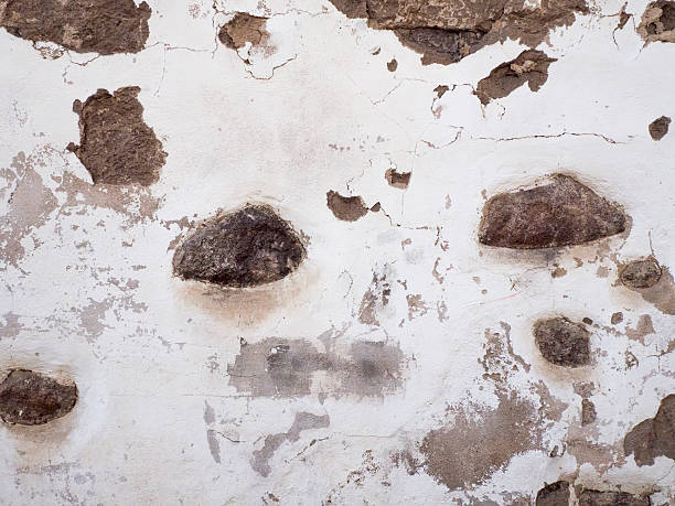 istock Background of old damaged stone wall texture 541142704