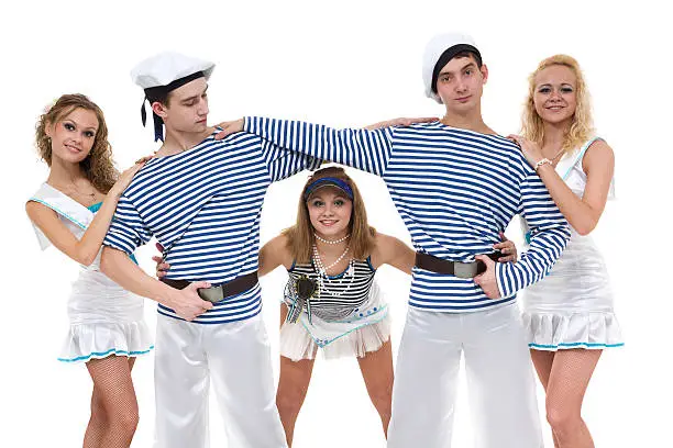 Carnival dancer team dressed as sailors. Retro fashion style, isolated on white background in full length.