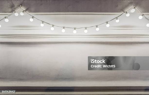 Background Of Light Bulbs String Stock Photo - Download Image Now - Illuminated, Lighting Equipment, String