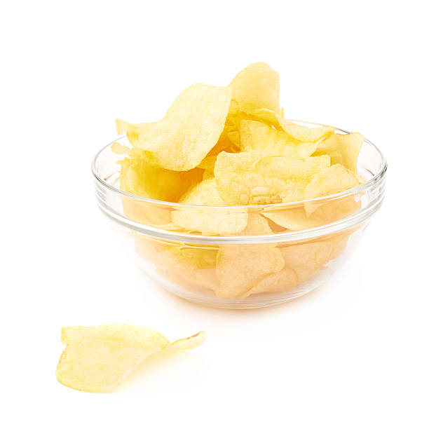 istock Multiple potato chips in a glass bowl 541143682