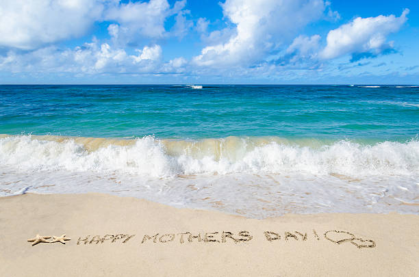 Mothers day on the beach background stock photo