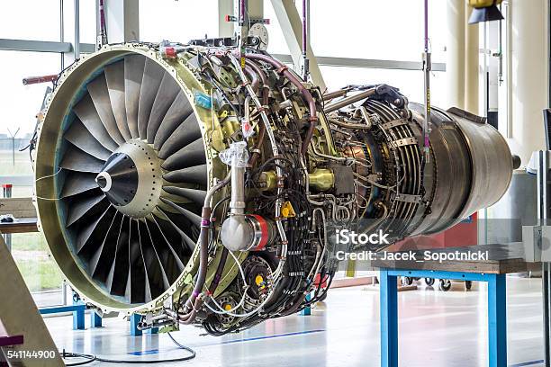 Engines Maintenance In Huge Industrial Hall Stock Photo - Download Image Now - Airplane, Repairing, Aerospace Industry