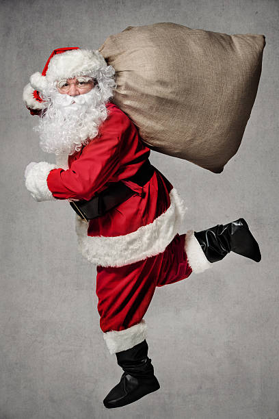 istock Santa Claus running 541148386