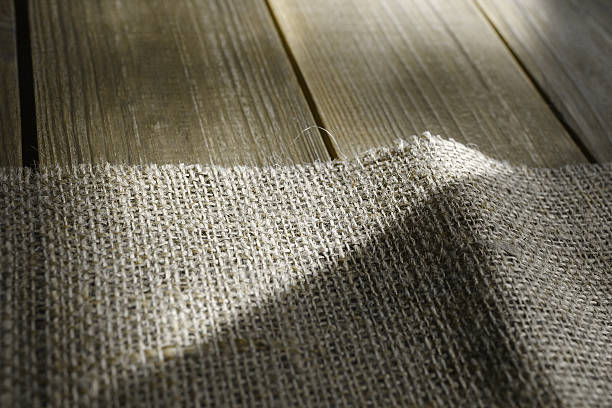 istock Cloth of burlap on wooden table 541149248