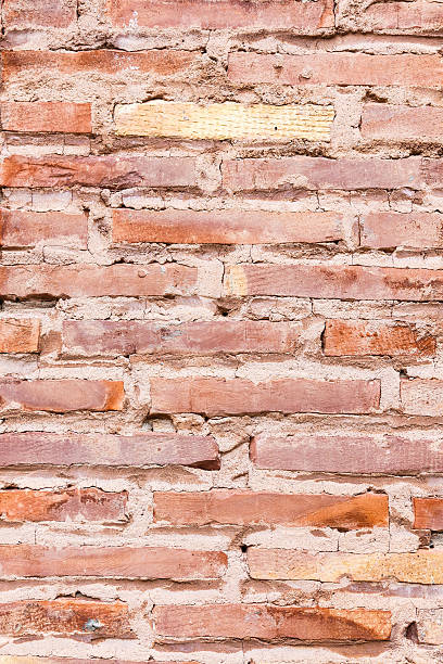 Ancient brick wall. Red texture. stock photo