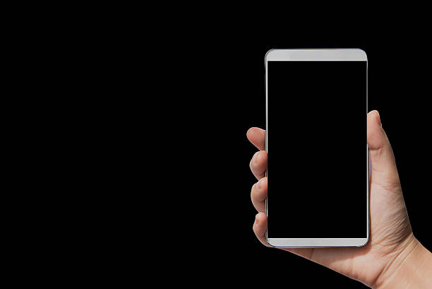 istock smart phone in hand isolated on black 541150606