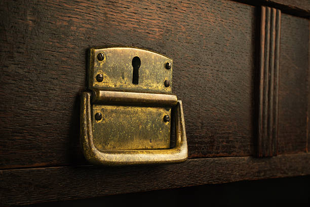 istock Old rusty lock in a wooden drawer 541150724