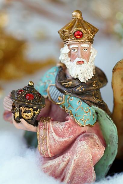 istock One of Magi offering gift in nativity scene 541150770