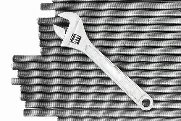accessory; background; bolt; build; chrome; closeup; concept; conceptual; connection; construction; engineer; engineering; equipment; grey; hardware; industrial; industry; iron; macro; many; material; mechanic; mechanical; metal; metallic; mount; mounting; nut; nuts and bolts; parts; production; repair; rust; screw; screw thread; silver; stainless; steel; texture; tighten; tool; work; zinc;