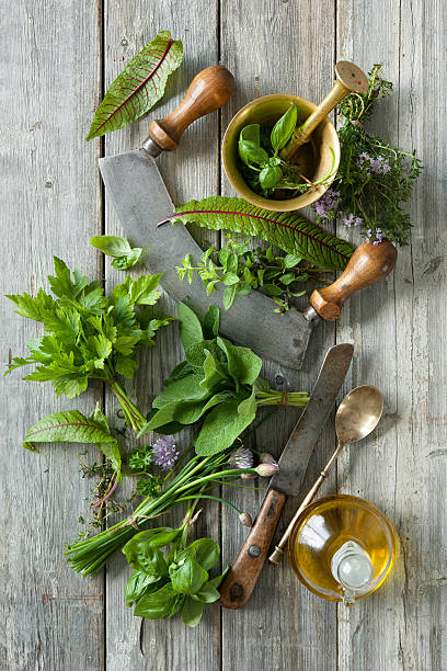 istock fresh herbs and spices on wooden table 541152104