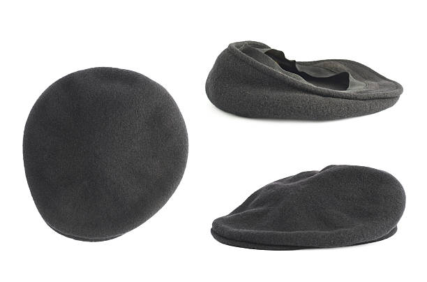 istock Black woven beret flat-crowned hat isolated 541154712